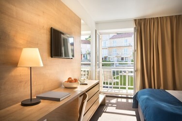 Comfort twin room with park view and balcony