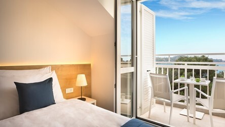 Superior twin room with side sea view and balcony