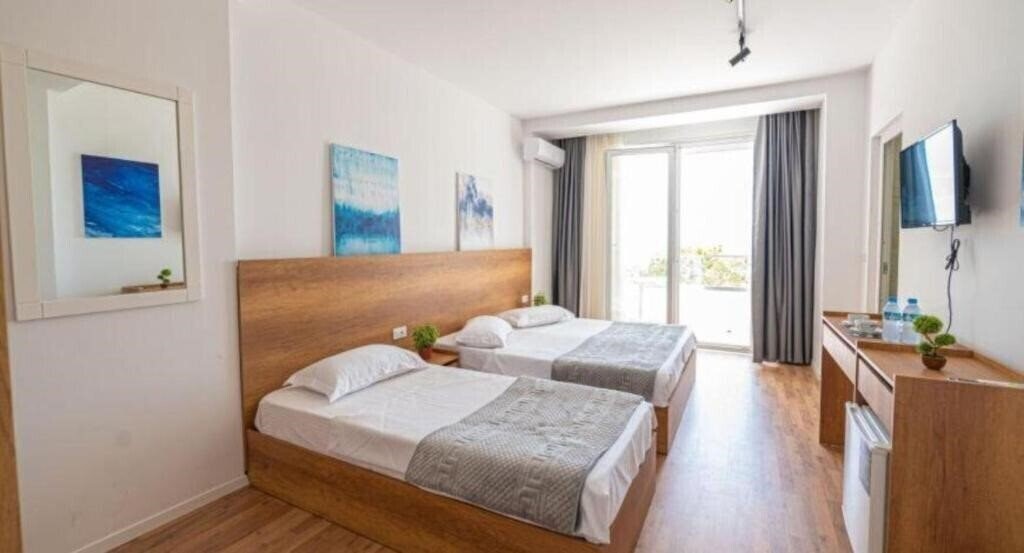 Zdjęcie Hotel Besani 3*