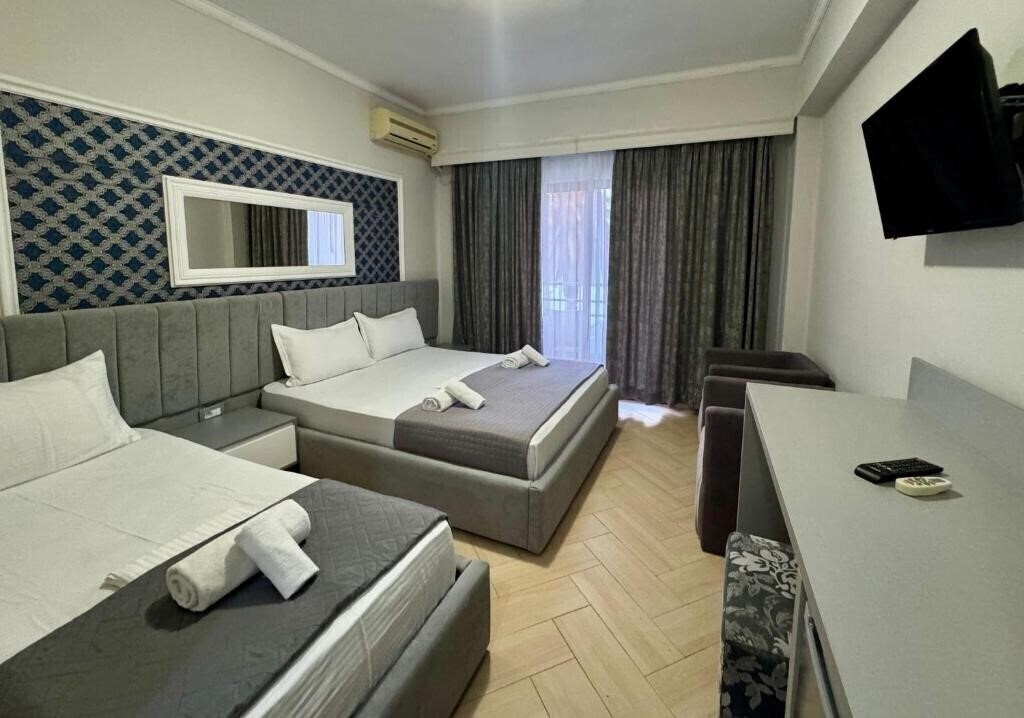 Изображение Pini 3*