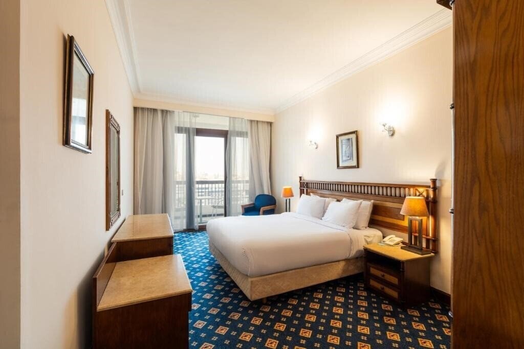 Zdjęcie Om Kolthoom Hotel 4*