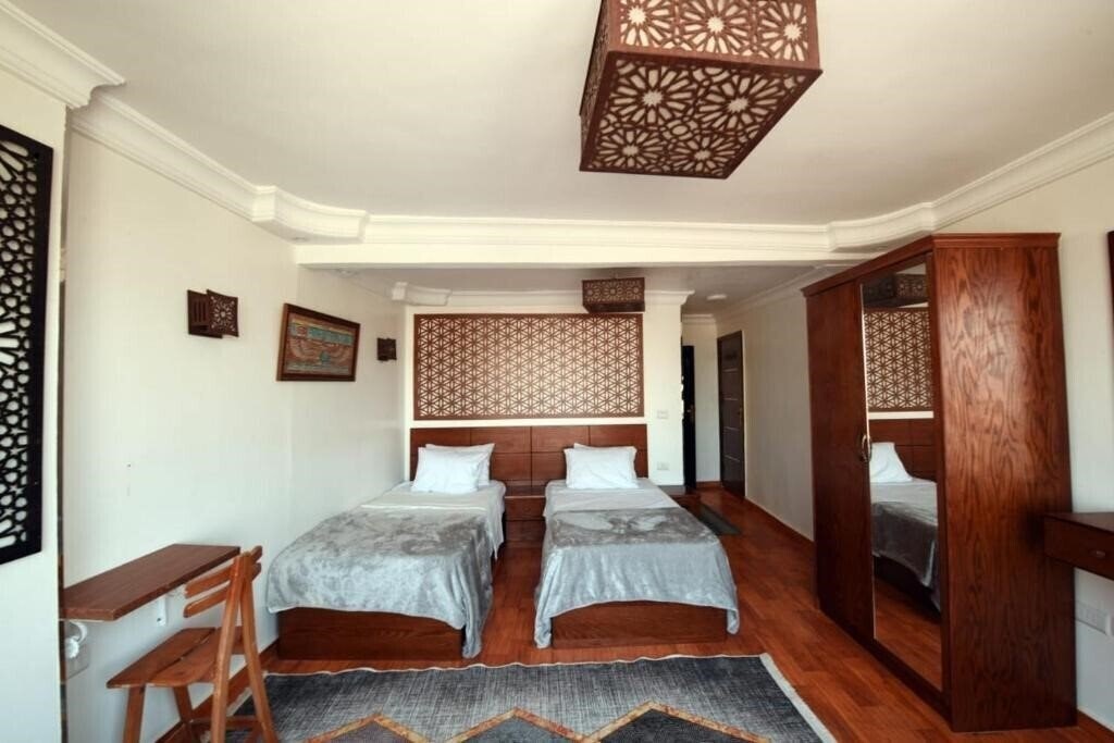 Obraz 9 Pyramids Inn 3*