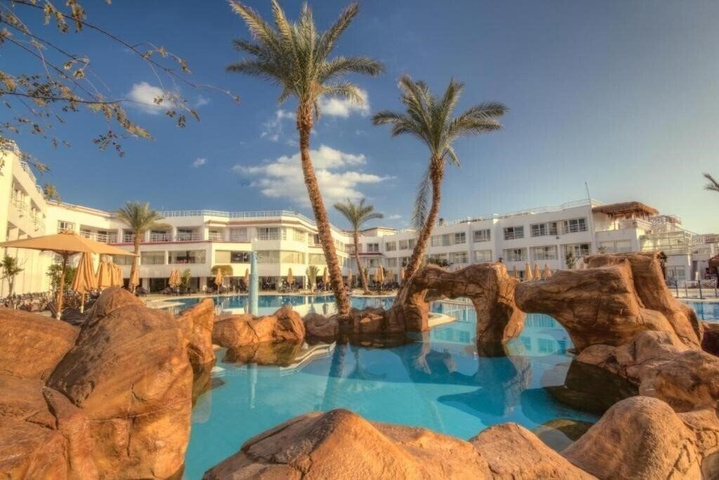 Фотографія Swiss Heaven Sharming Inn Hotel 4*