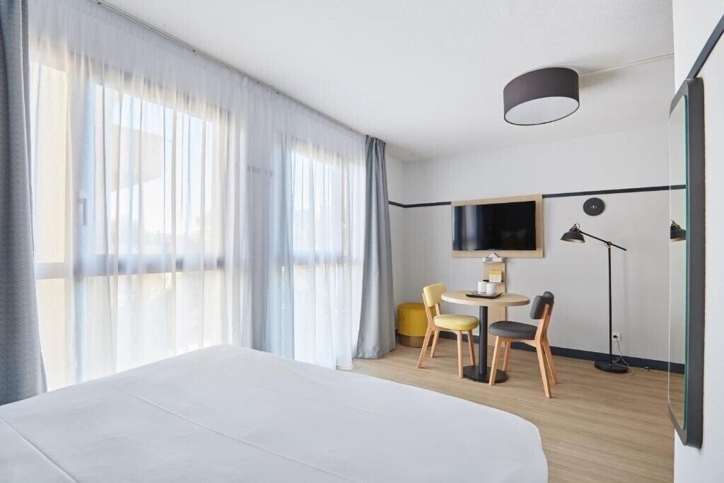 Zdjęcie Appart Hotel Odalys City Signature Aix en Provence Les Floridianes (ex. Appart'Hotel Odalys City Les Floridianes) 4*