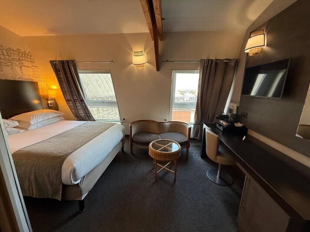 Фото Holiday Inn Paris Montmartre 3*
