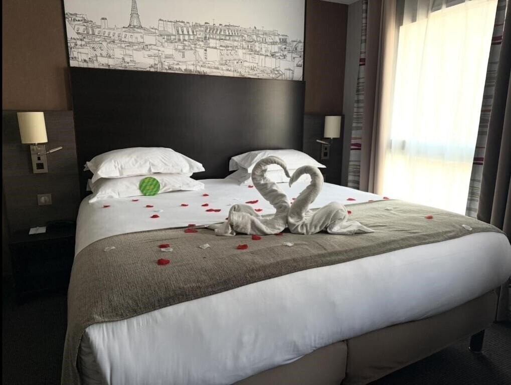 Фотография Holiday Inn Paris Montmartre 3*