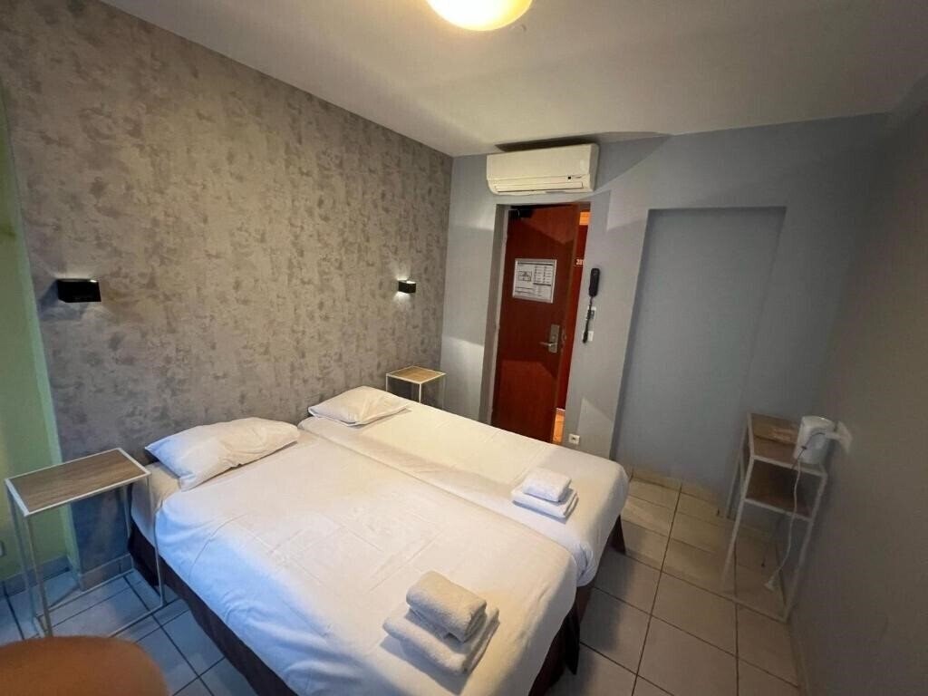 Zdjęcie Le Montclair Montmartre 3*