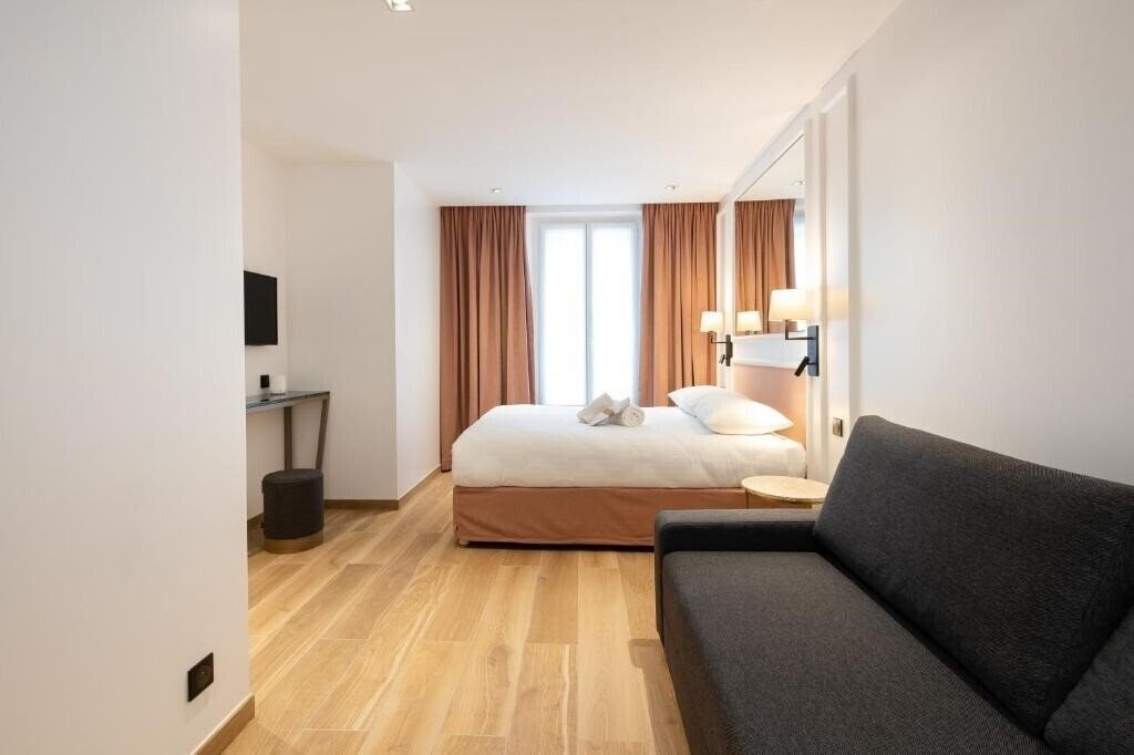 Zdjęcie Hotel Au Coeur de Republique 3*