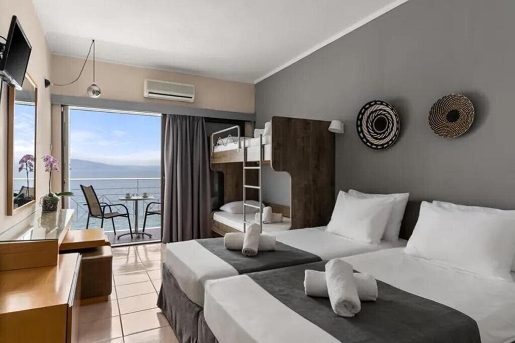 Фото Calamos Beach Family Club 3*