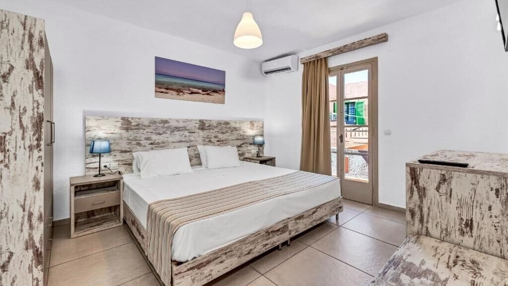 Фото Evina Rooms & Villas 3*