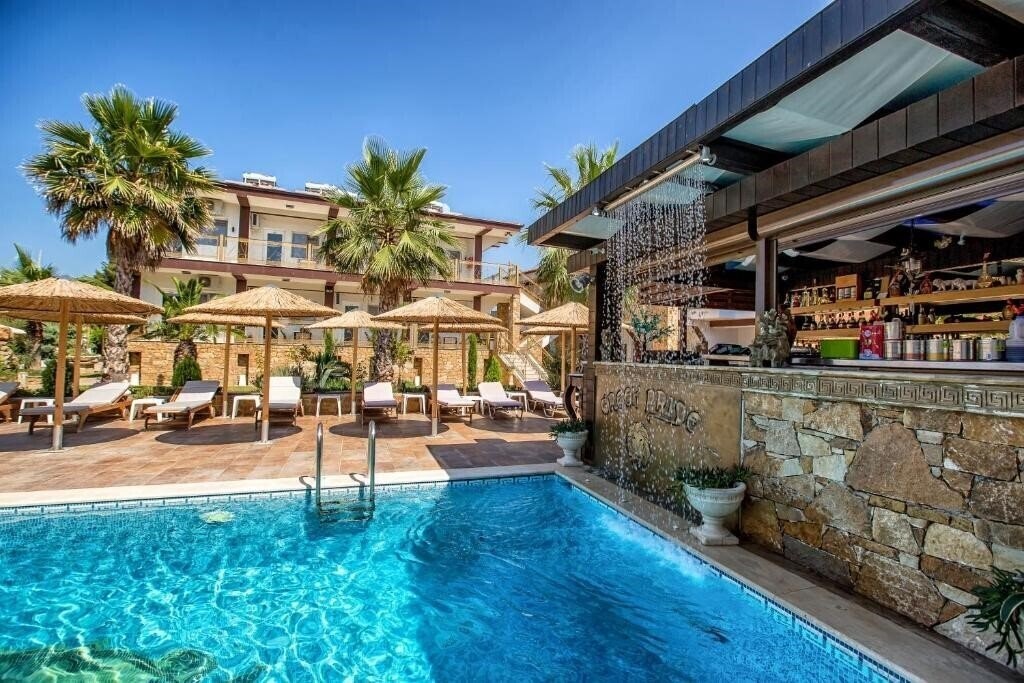 Фото Greek Pride Hotel & Apartments 4*