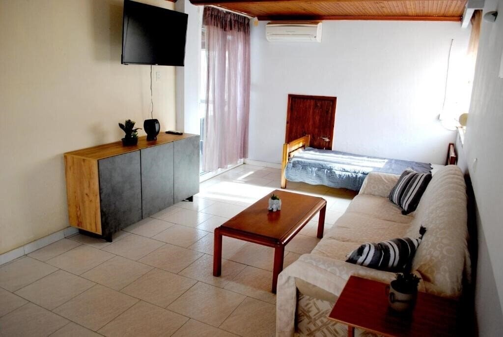 Фото Artemis Apartments апартаменты