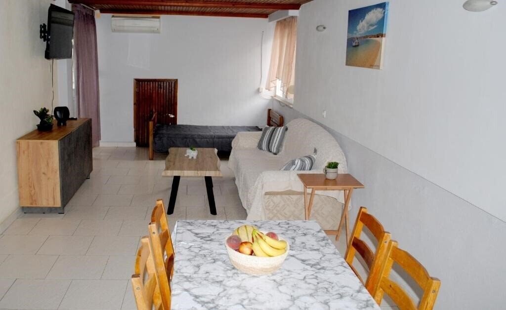 Фотографія Artemis Apartments апартаменты