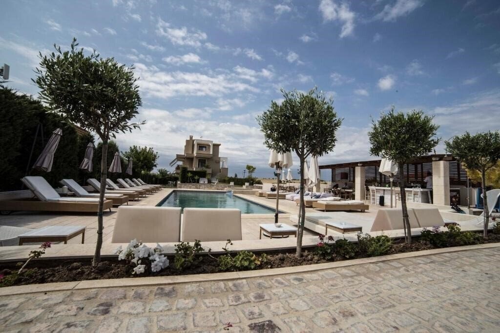 Zdjęcie Niovi Boutique Apartments 4*