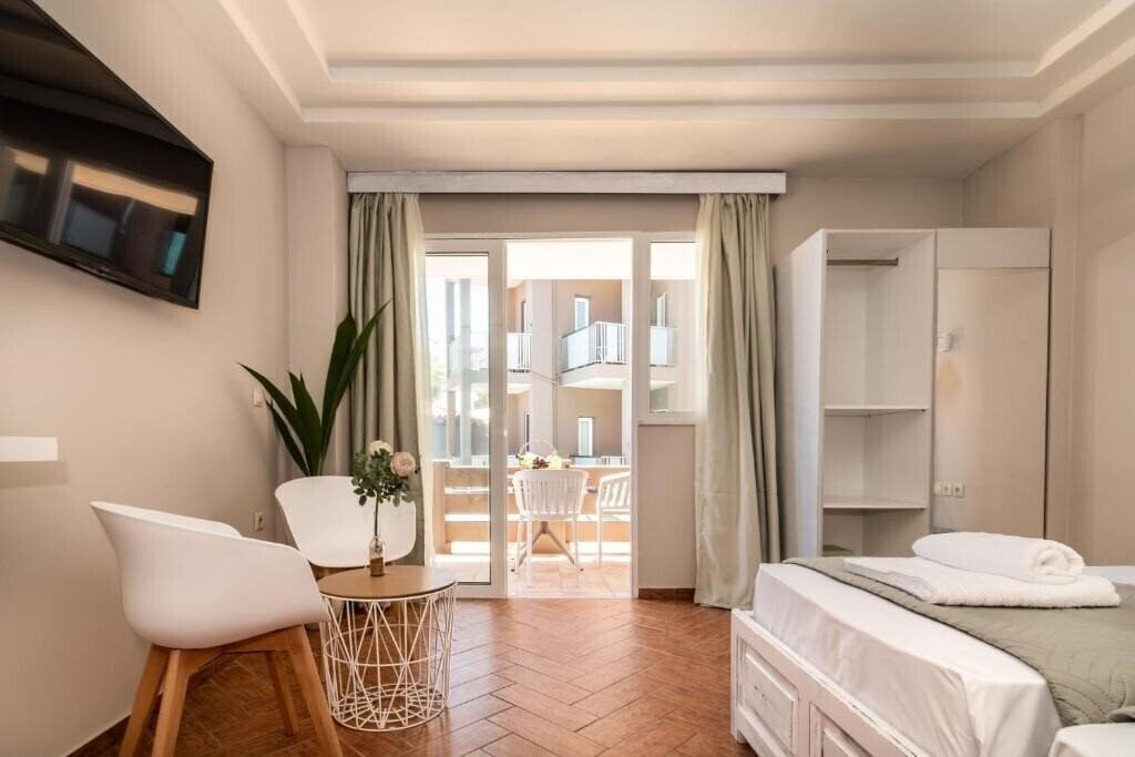 Фото Girogiali Apartments 3*