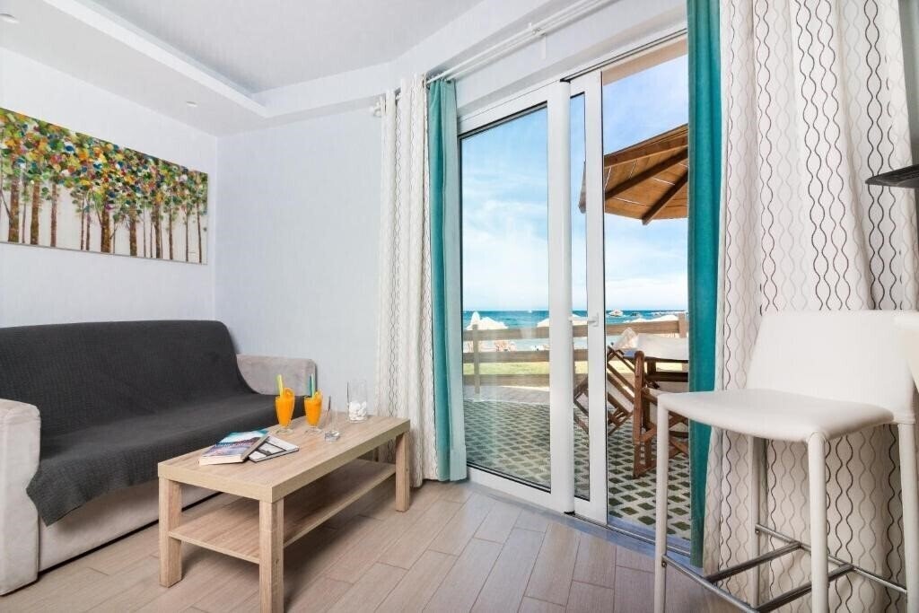 Obraz Christina Beach Hotel Nea Chora 3*