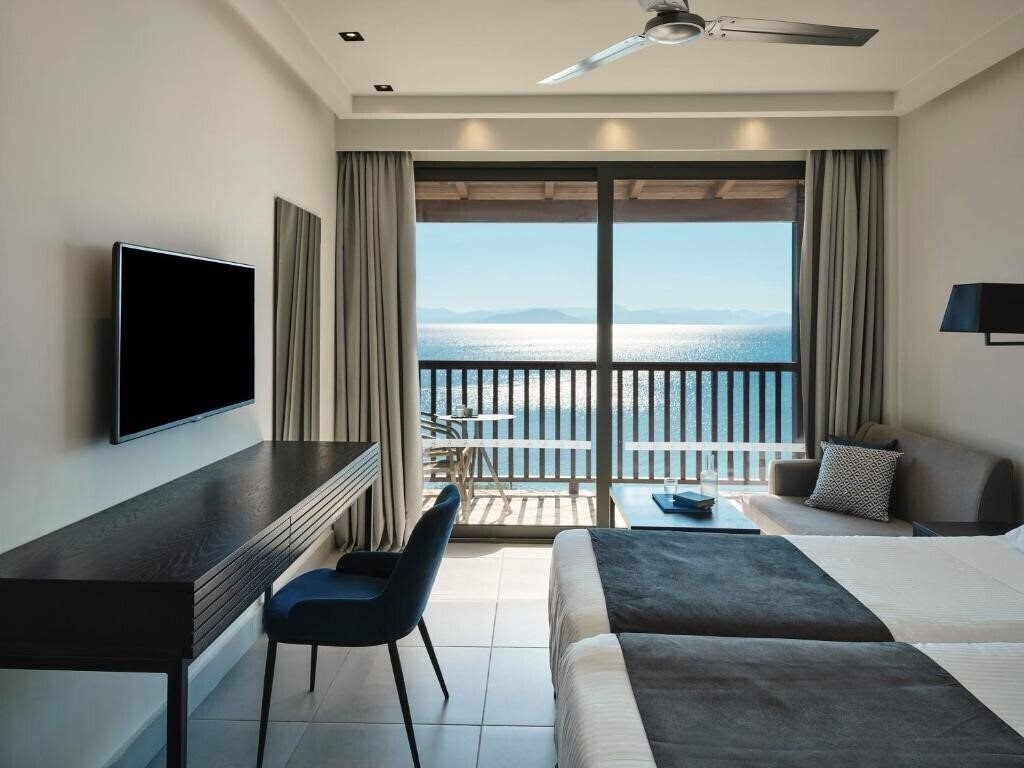 Фотографія Aeolos Beach Resort 4*