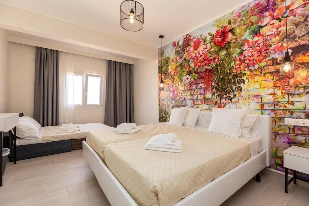 Zdjęcie Aqua Luxury Suites by Estia Roda 3*