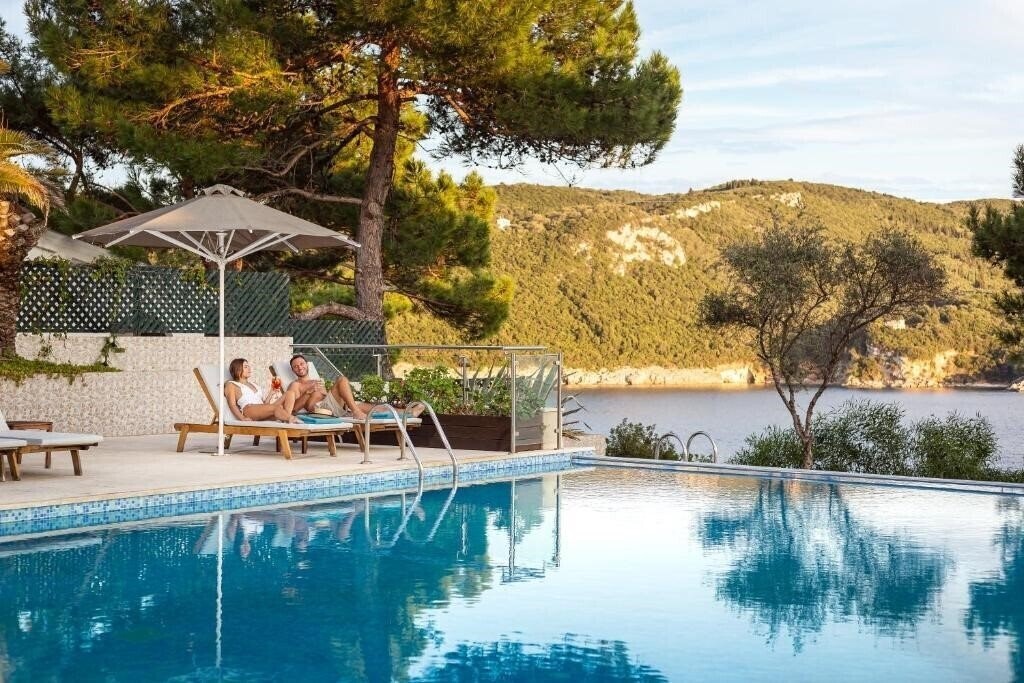 Фотографія Akrotiri Beach 4*