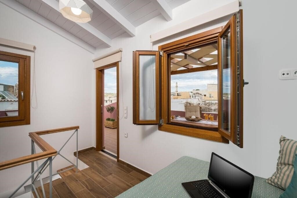 Zdjęcie Evlimeni Suites 4*