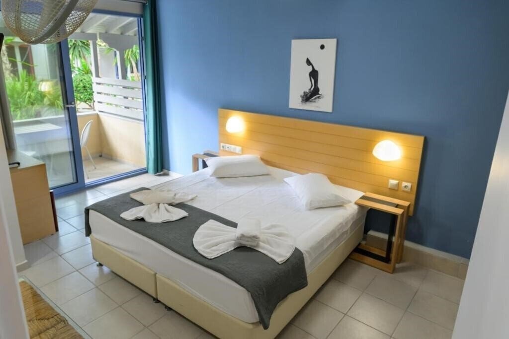 Zdjęcie Rouda Bay Beach Hotel (ex. Rouda Bay Hotel) 3*