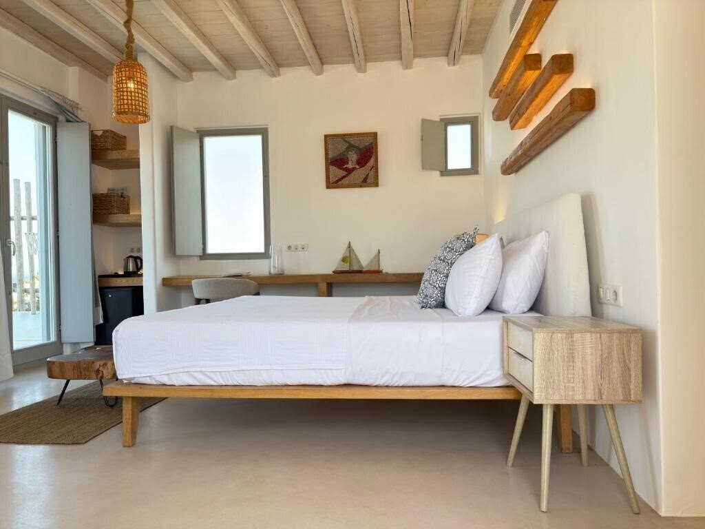 Фотографія Myconian Crown Suites 3*