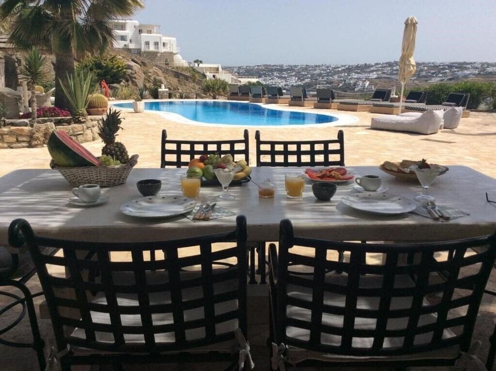 Фотографія Navy Blue Suites 4*