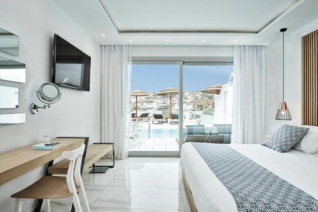 Фото Grand Beach Hotel Megali Ammos 4*