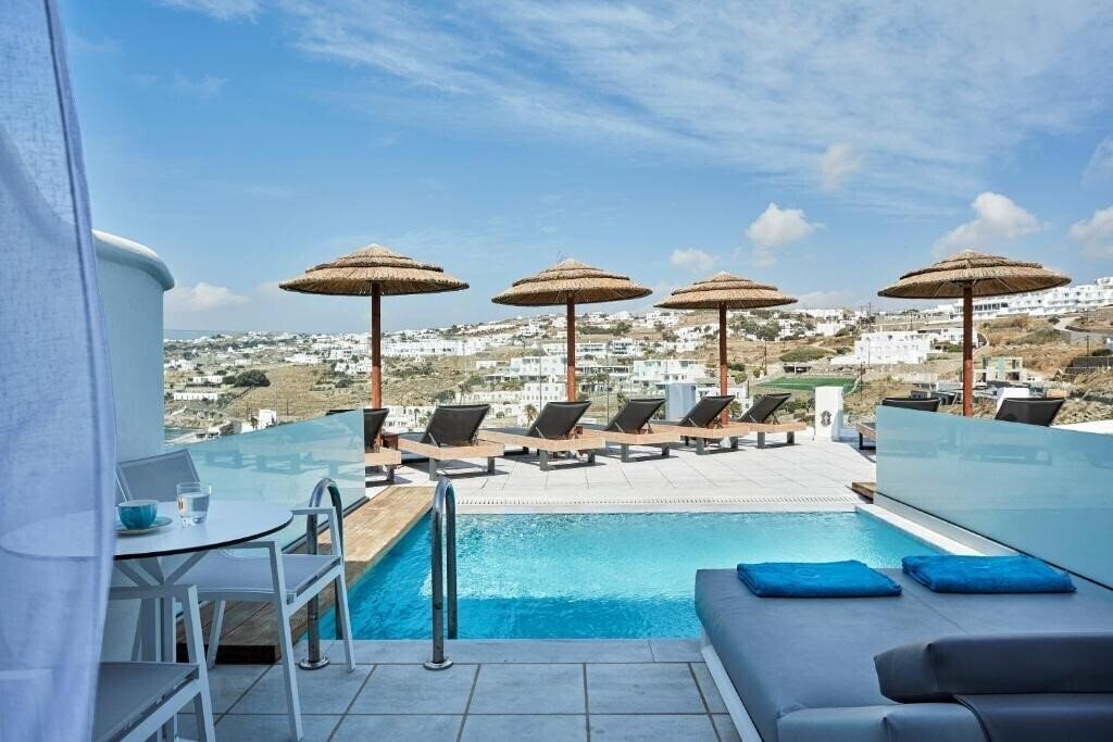 Фотографія Grand Beach Hotel Megali Ammos 4*