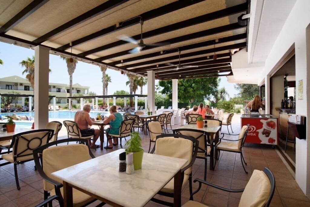 Фото Pefkos Village Resort 3*
