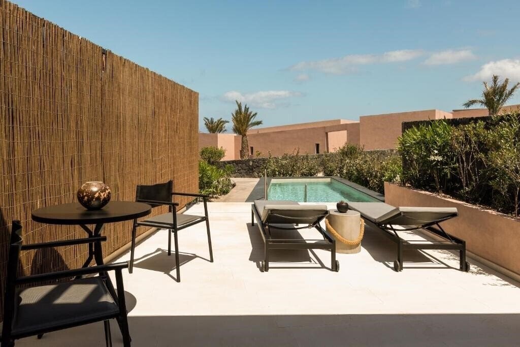 Zdjęcie Domes Novos Santorini 5*