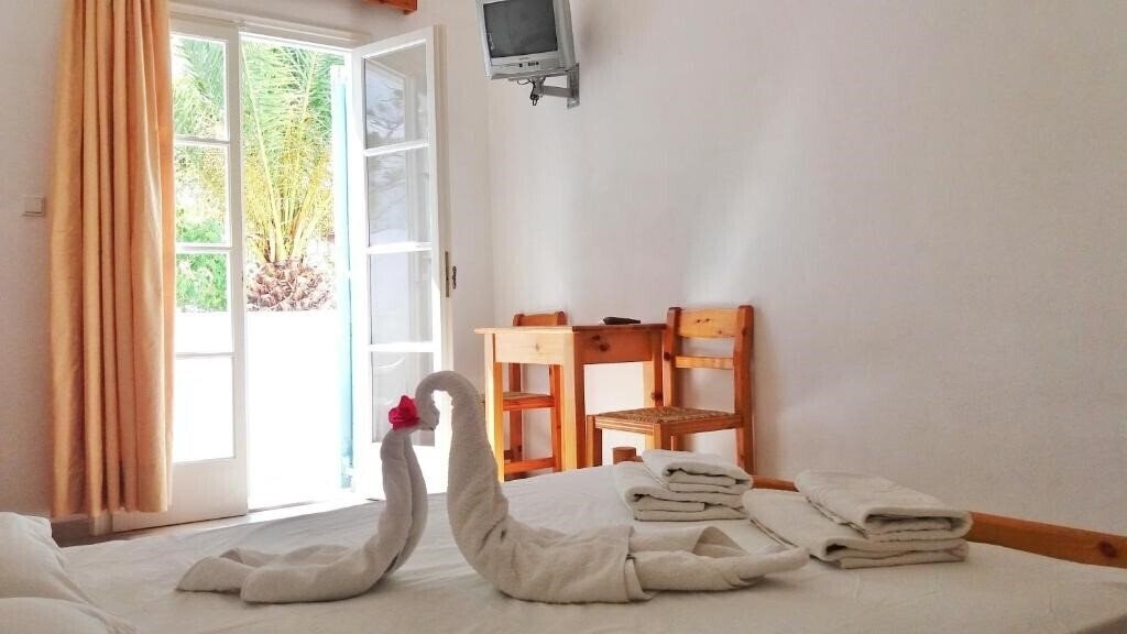 Фотографія Kymata Hotel Kamari 2*