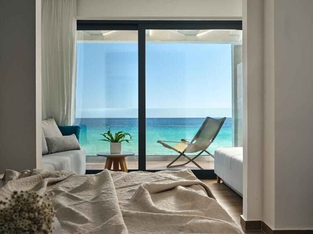 Hotel Cavo Orient Beach Hotel & Suites 4*