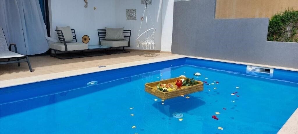 Zdjęcia Cavo Orient Beach Hotel & Suites 4*