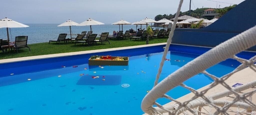 Zdjęcie Cavo Orient Beach Hotel & Suites 4*