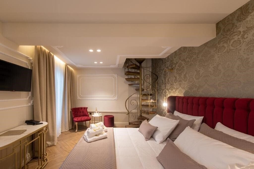 Obraz Capolavoro Suites 4*