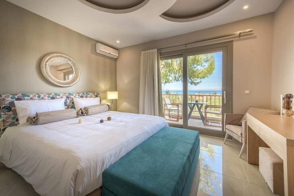 Готель Koukounaria Aparthotel & Villa 4*