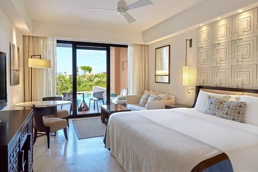 Фото The Romanos, A Luxury Collection Resort 5*