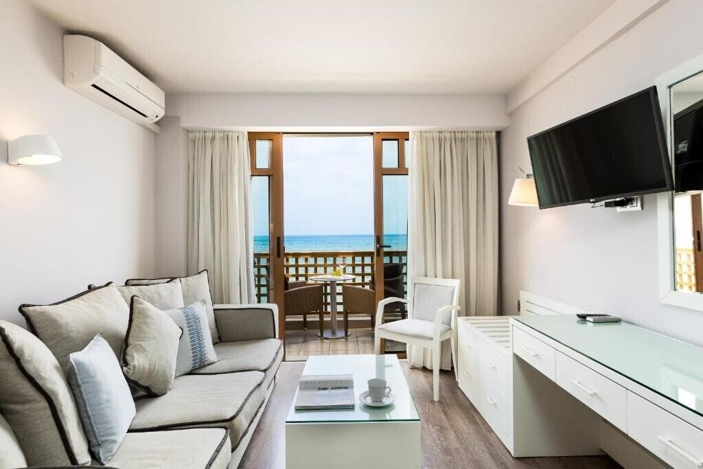 Фотографія Ammos Studios 4*