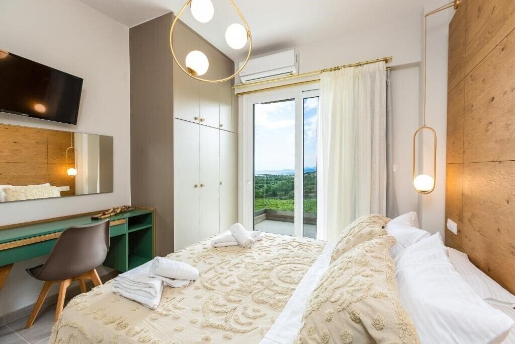 Фотографія Vigla Suites 4*