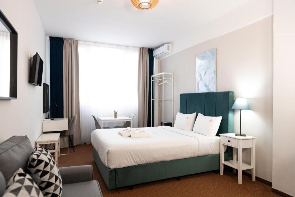Zdjęcie City Plaza Apartments & Rooms 3*