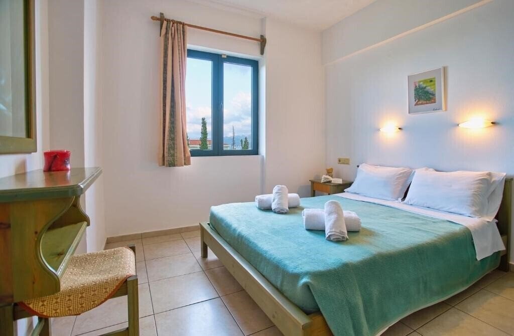 Фото Dionysos Apartments & Studios 4*