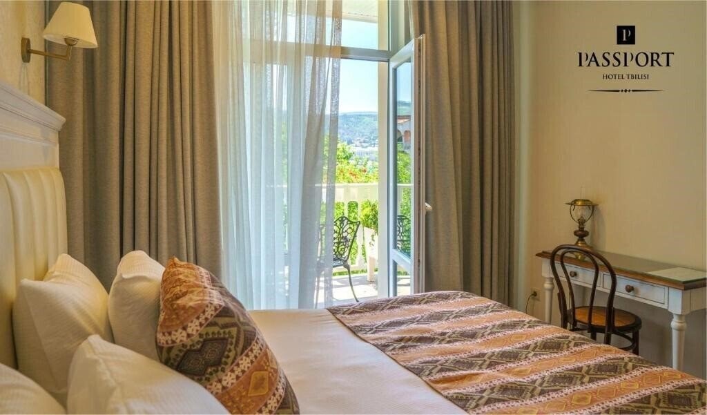 Zdjęcie Passport Hotel 4*