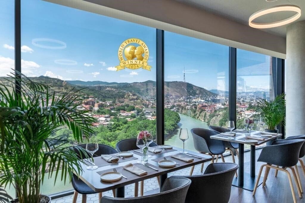 Отель Golden Tulip Design Tbilisi Hotel 4*