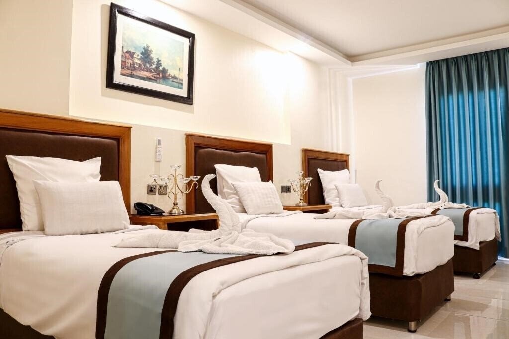 Zdjęcia Raed Suites 3*