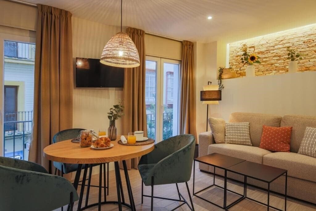 Отель Magna Sevilla Apartamentos 3*