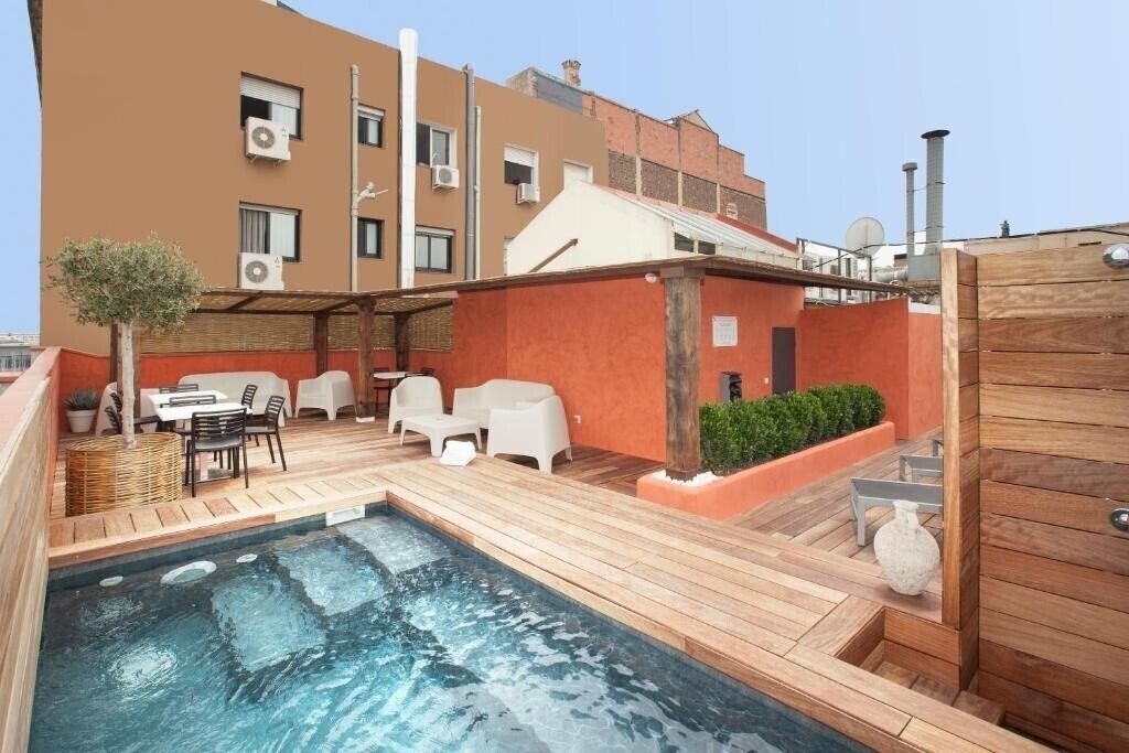 Zdjęcie Enjoybcn Colon Apartments 4*