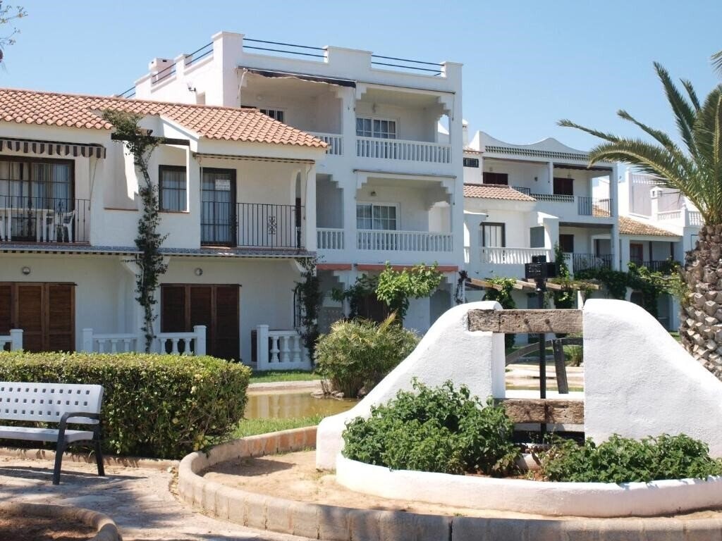 Фотография Apartamentos Habitat Playa Romana 3000 3*