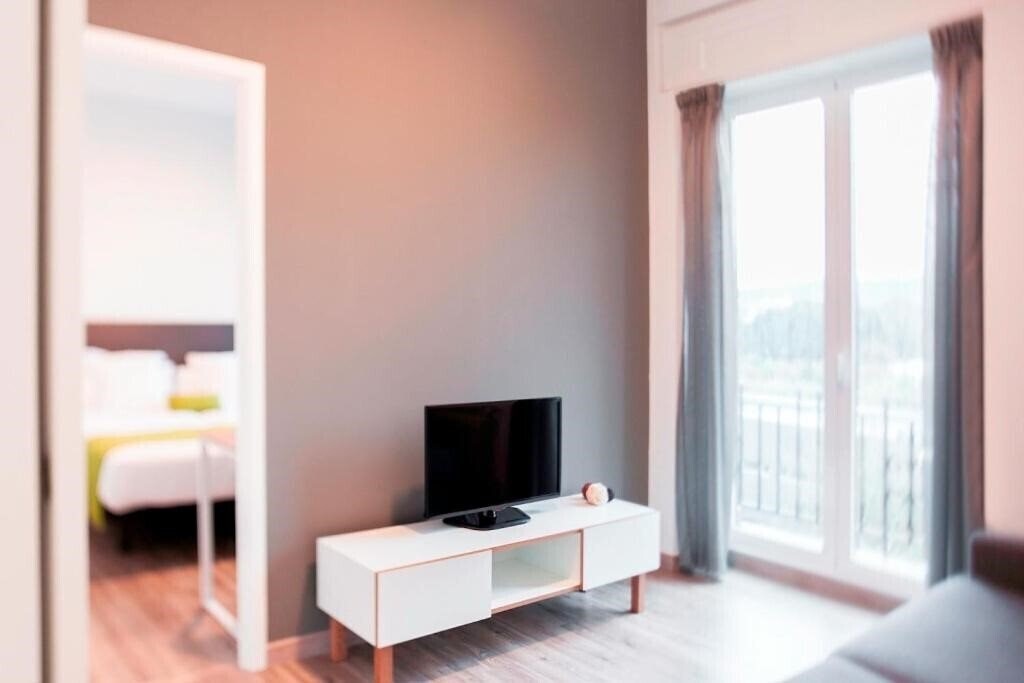 Фотография Lux Apartamentos Santiago (ex. Lux Santiago Hotel) 3*