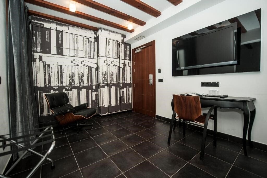 Фотографія Posada Del Leon De Oro 4*